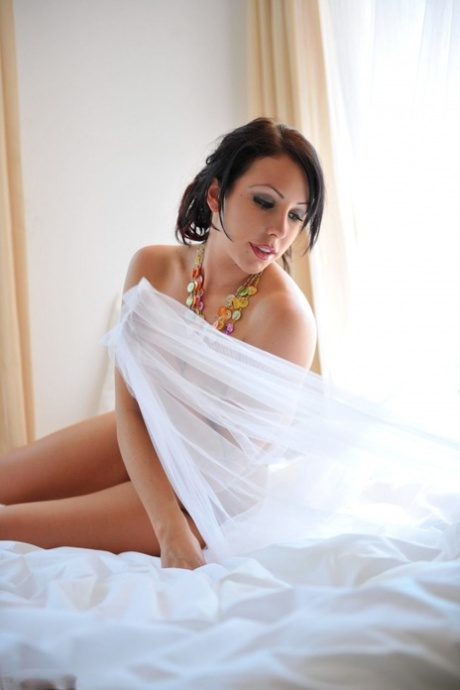 Solo model Nina Leigh pets her beautiful pussy with manicured fingernails 39625704