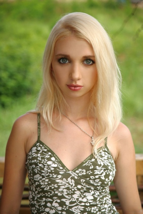 Beautiful blonde Mina sheds her shorts on the deck flaunting tiny tits & slit 84745401