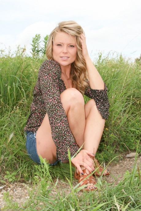 Amateur chick slides her jean shorts over her thong covered along water's edge 28319828