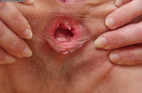Lusty mature office gal stripping and exposing her pink twat in close up
